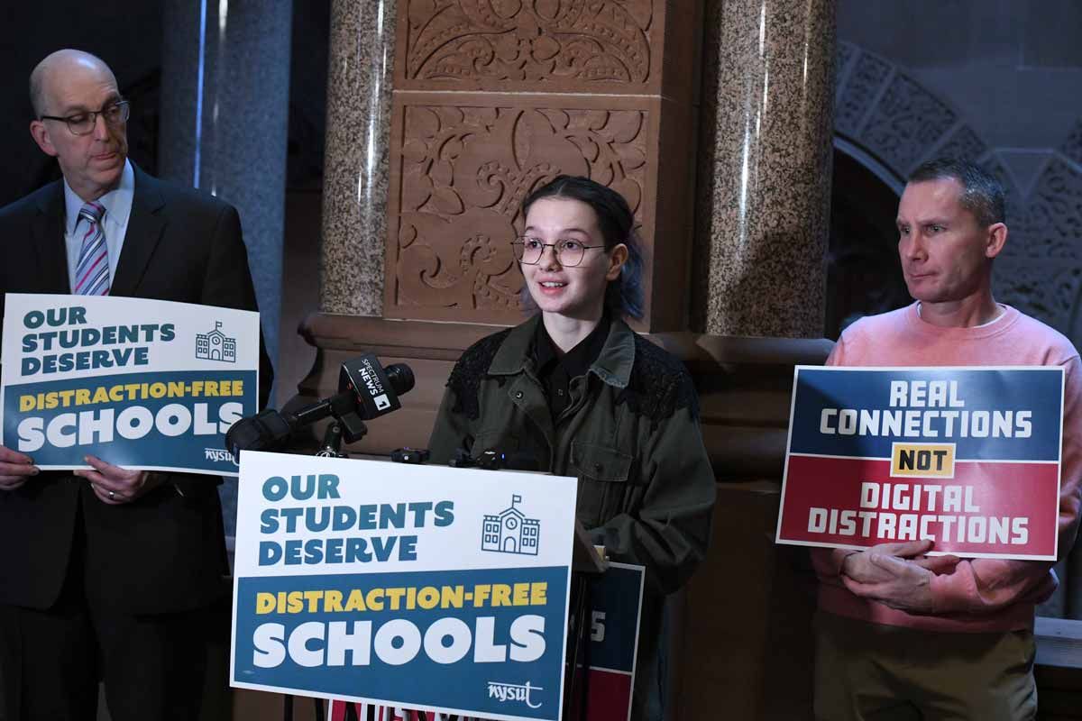Student talking at a press conference